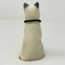 A  Lucky Cat figure hand painted to look like a blue point Siamese with a navy collar and L charm. Rear view.