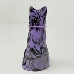 A purple and black marbled cat figurine wearing a purple collar with a gold initial 'P' charm, set against a plain light grey background. Rear view.