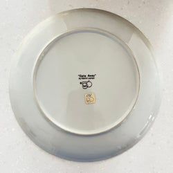 Ceramic plate with a logo on a white background