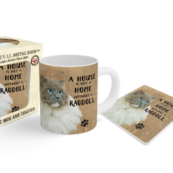 Ceramic mug, coaster, and retail box set featuring a fluffy cat photo and the printed phrase 'A HOUSE IS NOT A HOME WITHOUT A RAGDOLL'