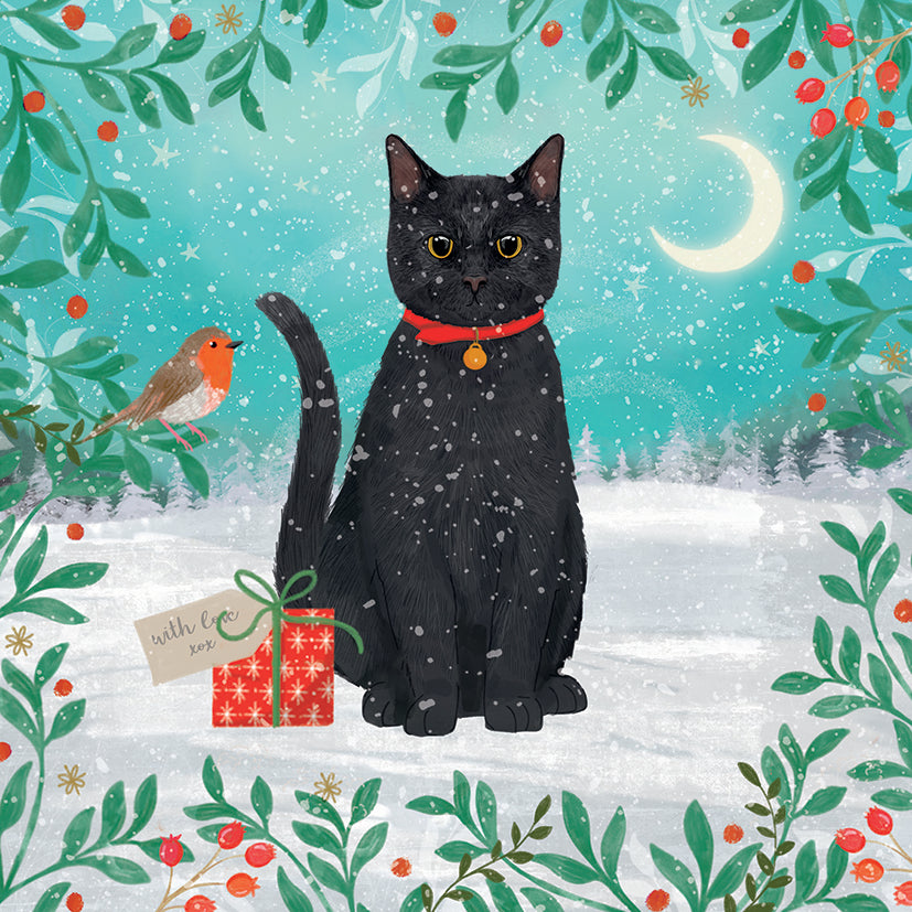 Black cat with a red collar in a snowy scene with a wrapped red present, greenery and a robin.