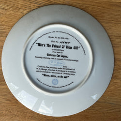 White ceramic plate with text and a logo on a wooden surface
