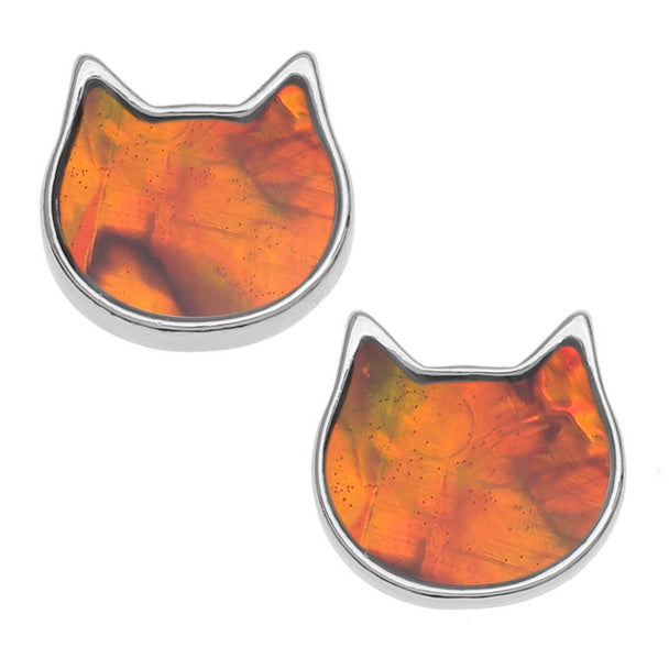A pair of paua shell orange cat face ear studs with silver-coloured outlines and stainless steel posts.