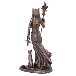 Statue of an Egyptian goddess with a cat on a white background