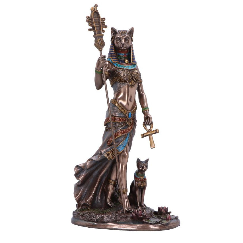 Statue of a Egyptian goddess with a cat on a white background