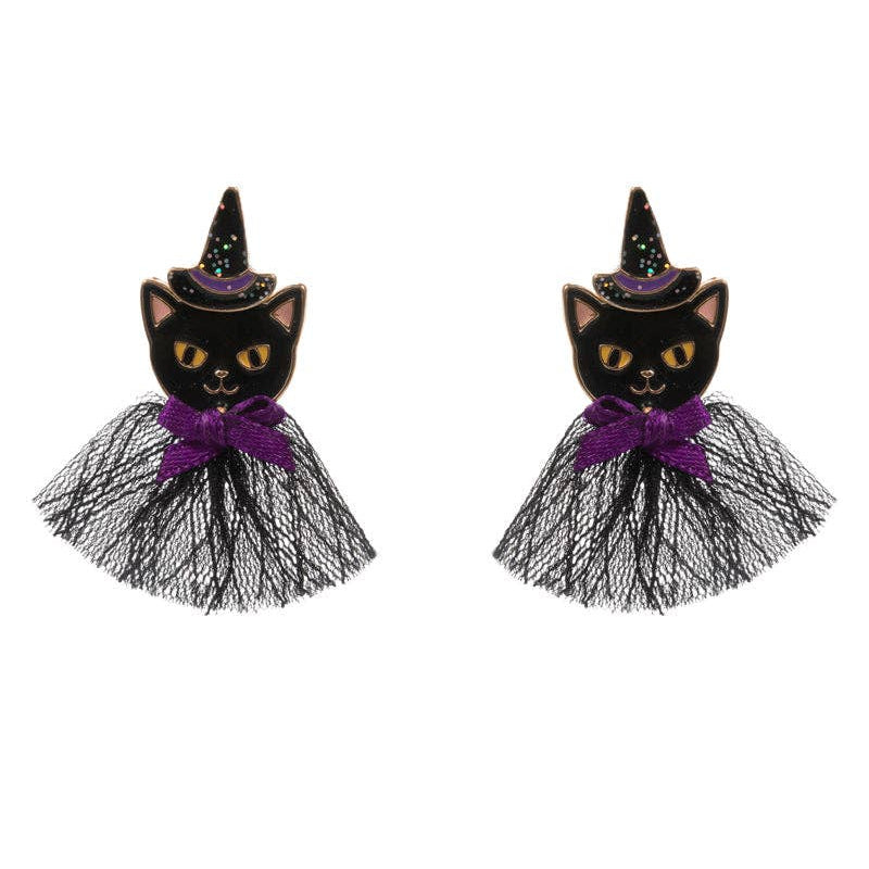 Pair of black cat earrings with witch hats and purple bows on a white background
