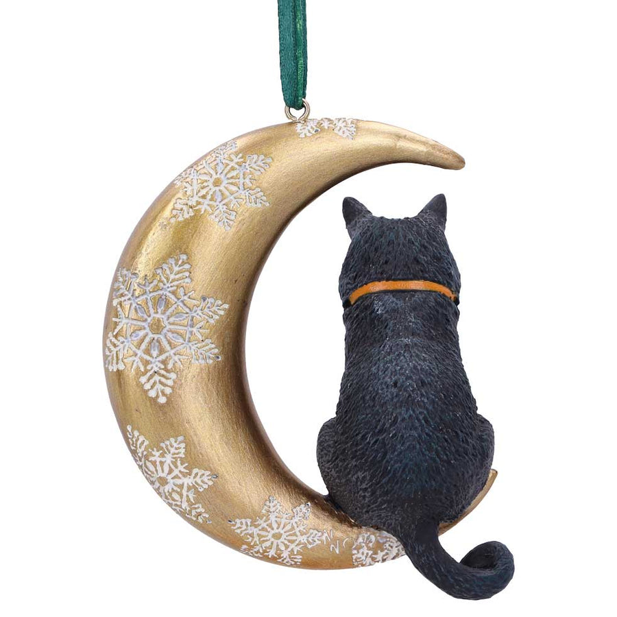Decorative ornament with a cat sitting on a gold crescent moon with snowflake patterns