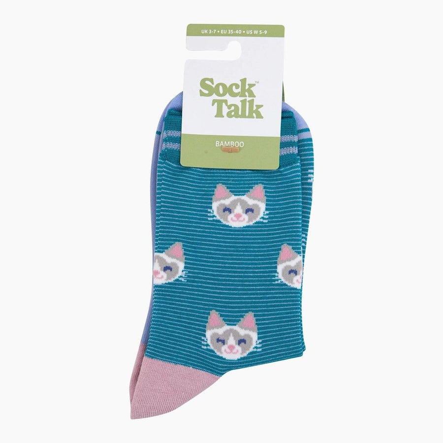 A pair of Bamboo crew socks featuring a teal blue and pink striped pattern with cartoon cat faces