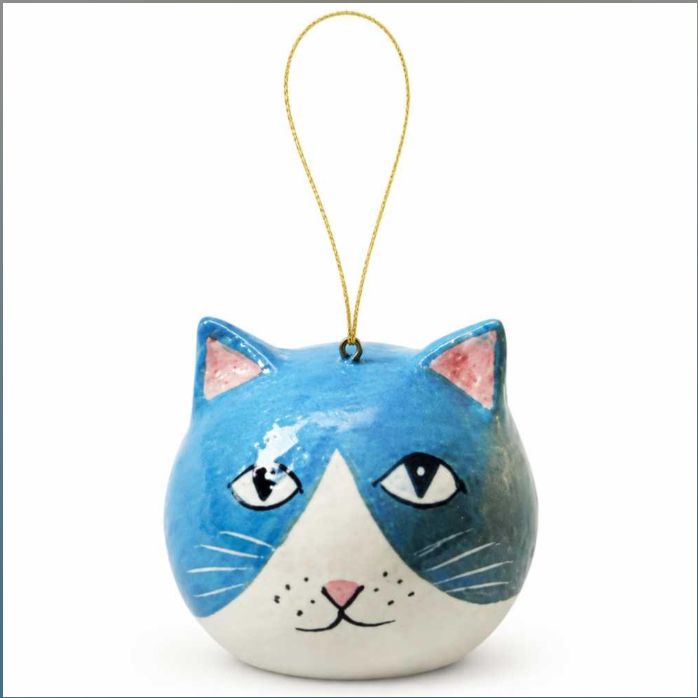 A cat-shaped hanging ornament with a blue and white face, pink inner ears, and a gold hanging string, shown on a plain white background.