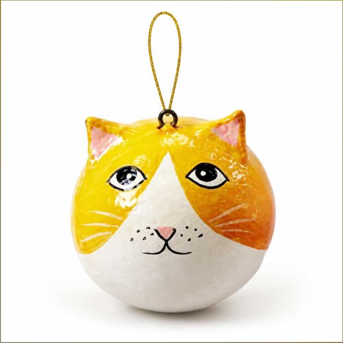A round, hand-painted cat ornament with a yellow and white color scheme, featuring detailed black eyes, whiskers, and a gold hanging loop at the top