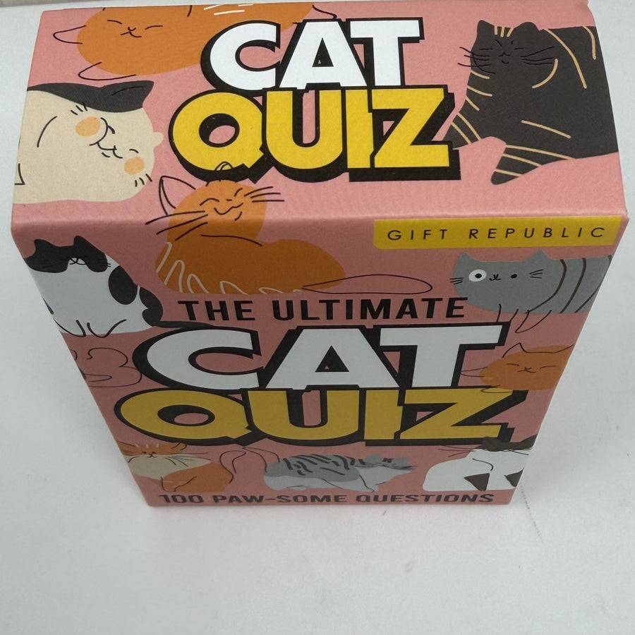The Ultimate Cat Quiz gift box by Gift Republic, featuring a pink background decorated with various cartoon cat illustrations