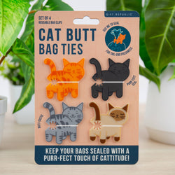 Packaging of Cat Butt Bag Ties with cartoon cats on a beige background