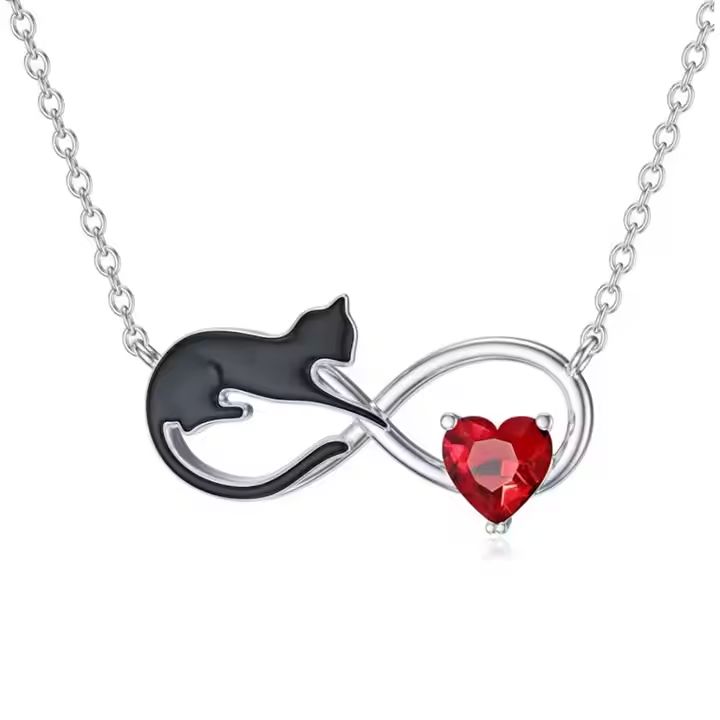 Necklace with a black cat and red heart design on a white background