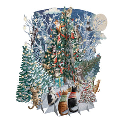 3D pop up card with cats around decorated Christmas trees in a snowy moonlit scene
