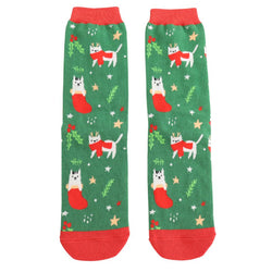 White Cats Sock Pair on a green background with red toes. Stars and mistletoe decorations. 