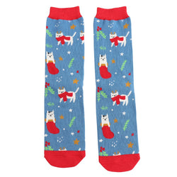 A pair of blue socks with red toes with a white cat design wearing red scarves.  Mistletoe details. 