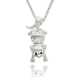 Silver cat-shaped pendant on a chain against a white background