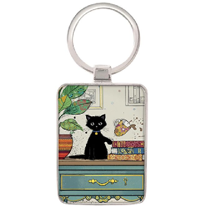 Black Kitty Keyring. Cat knocking mug off a table