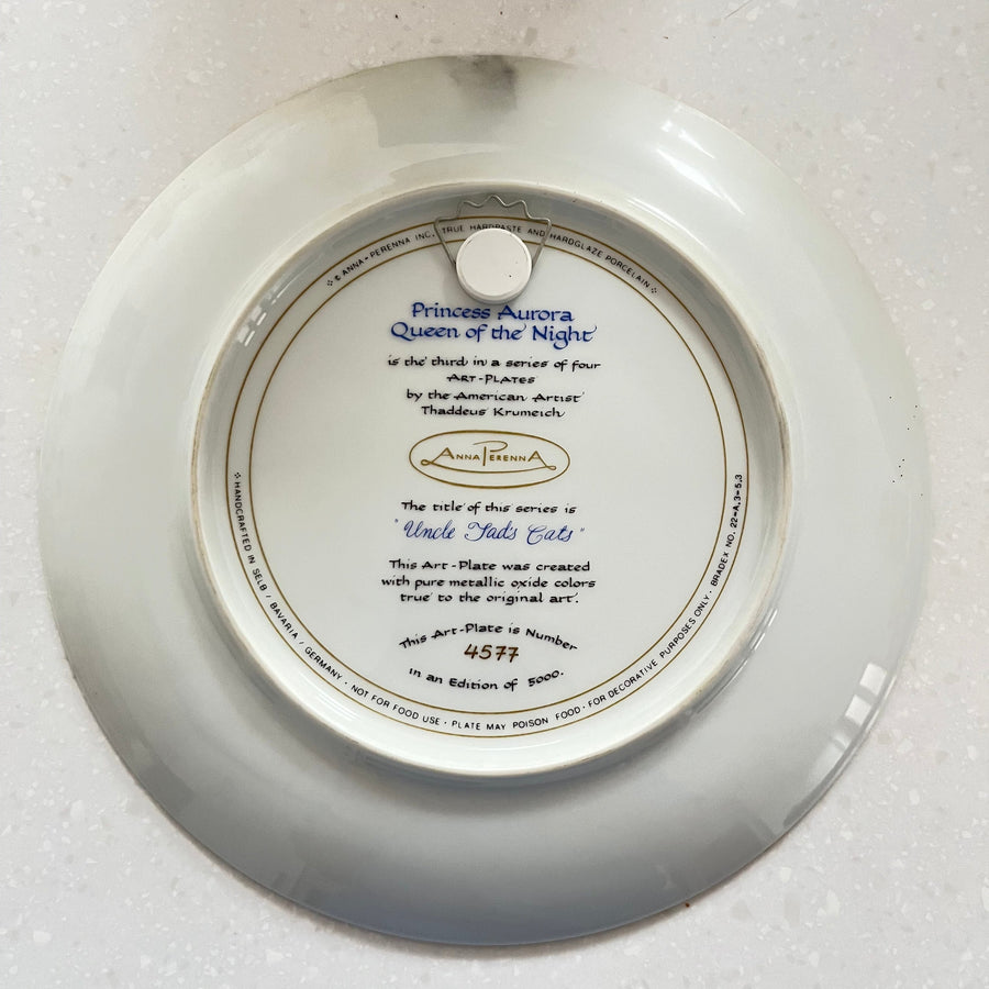 Decorative plate with text and a logo on a white background