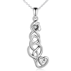 A sterling silver pendant necklace featuring a stylised cat silhouette made of Celtic knotwork, with a heart-shaped clear gemstone