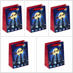Five identical Christmas-themed gift bags: Black cats looking up at Santa's sleigh against a large yellow moon in a night sky.