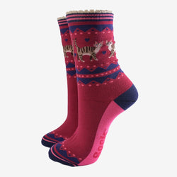Red socks with a striped kitty pattern on a white background