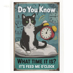 A vintage-style illustrated design featuring a black-and-white cat sitting on a pillow and reaching for a red alarm clock. With text 'Do You Know WHAT TIME IT IS? IT'S FEED ME O'CLOCK'.