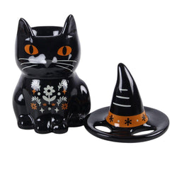 Black cat-shaped container with a witch hat on a white background