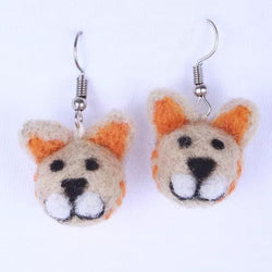 Felted cat head earrings on a white background