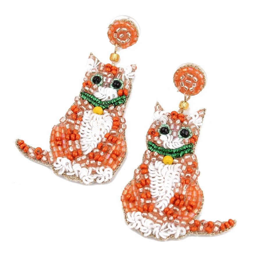 Cat-shaped earrings with ginger and white beadwork on a white background