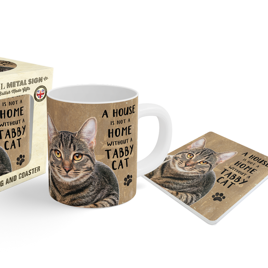 A ceramic mug, matching coaster, and retail box featuring a tabby cat illustration and the phrase 'A HOUSE WITHOUT A TABBY CAT.'