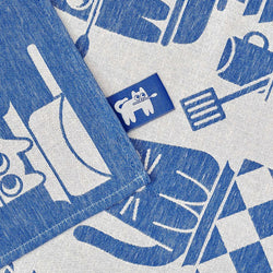 Blue and white cats patterned fabric with a cat logo in the centre