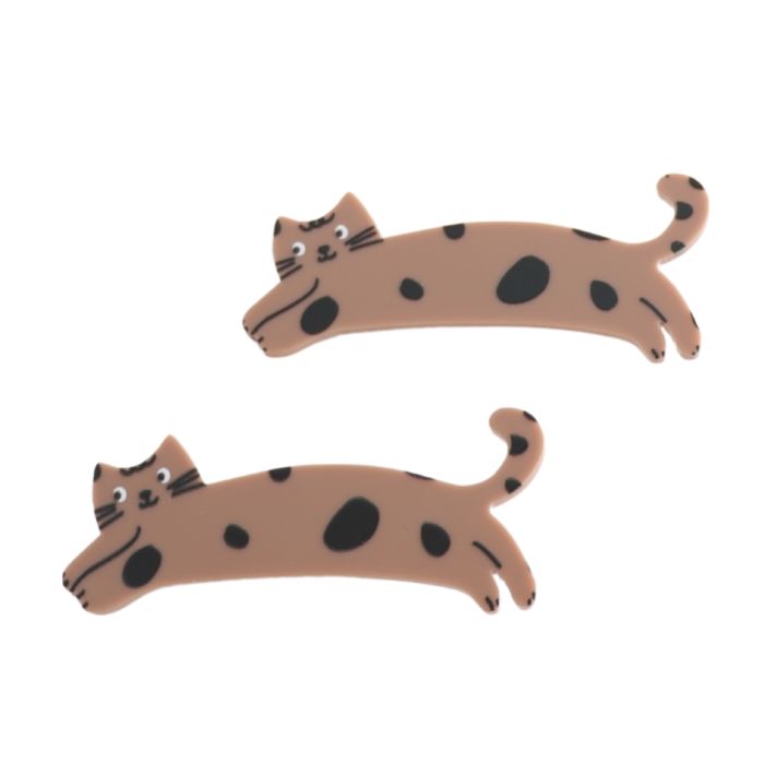 Two small cat-shaped hair clips in a tan color with black spots, shown on a plain white background.