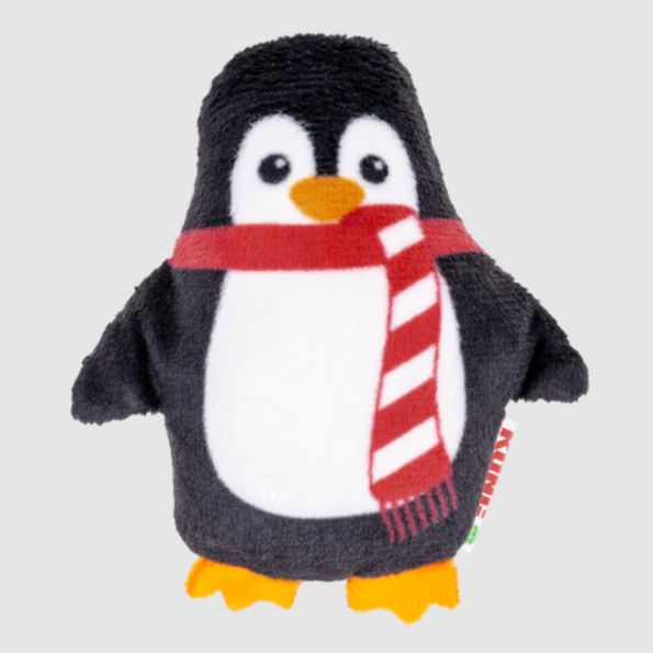 Penguin toy with a red and white striped scarf on a light gray background