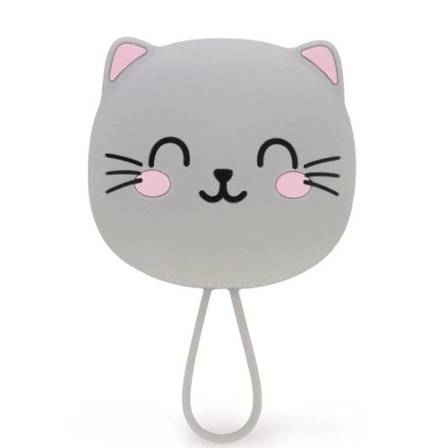A grey cat-shaped brush with a smiling face, pink inner ears and cheeks, and black whiskers