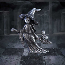 Decorative figurine of a witch with a broom and cat on a dark background