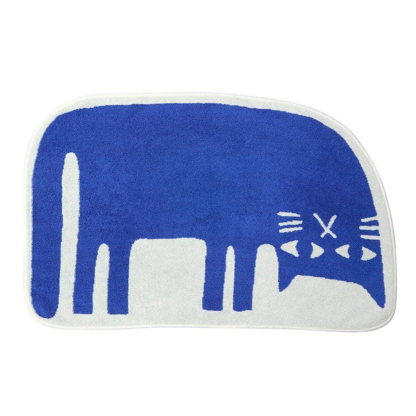 Blue and white cat-shaped bath mat on a white background