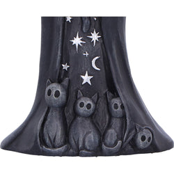 Decorative item with three cats under a starry sky