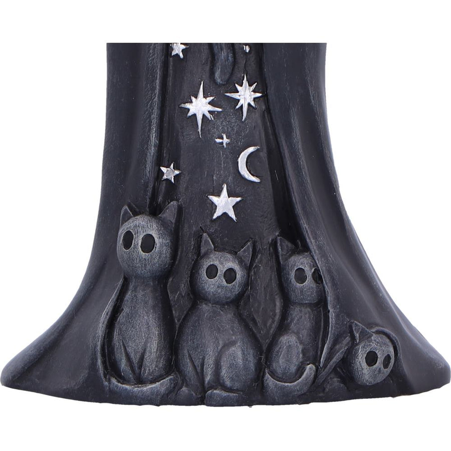 Decorative item with three cats under a starry sky