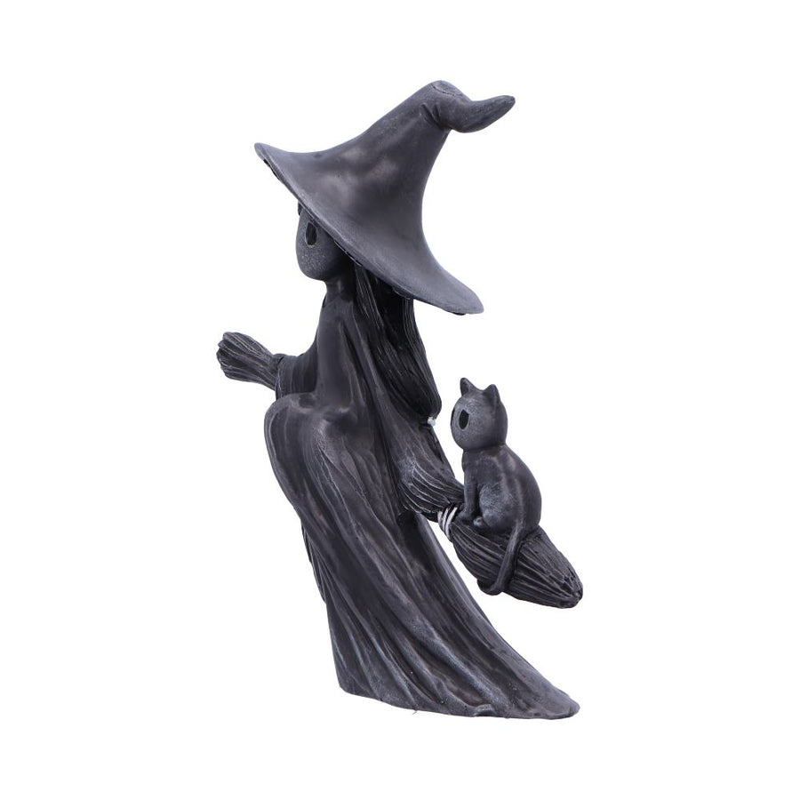 Statue of a witch with a broom and a cat on a white background