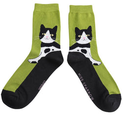 A pair of Tuxedo Cat Socks. A green and black sock with tuxedo cat design. 