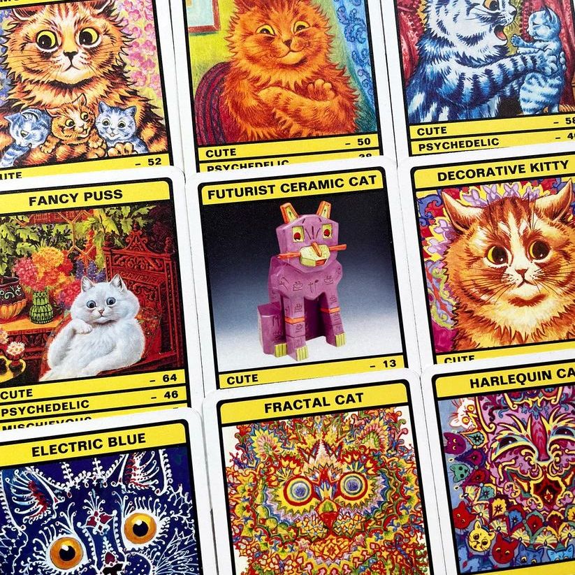 Close up of Louis Wain's Cats card game packaging with colourful cat illustrations