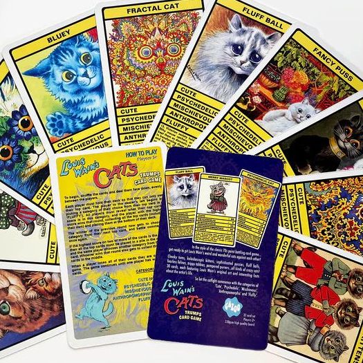 Collection of 'Louis Wain's Cats' themed trading cards with colourful illustrations and a game card.