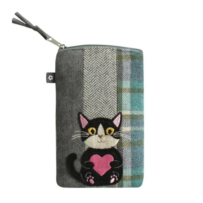 A zippered fabric pouch featuring a black and white cat embroidered in the centre, holding a pink heart