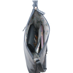 Grey handbag with floral interior, containing a phone and purse, on a white background.