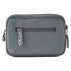 A grey pebbled leather camera bag with a front zippered pocket featuring a decorative gray and white floral zipper pull, shown against a plain white background.