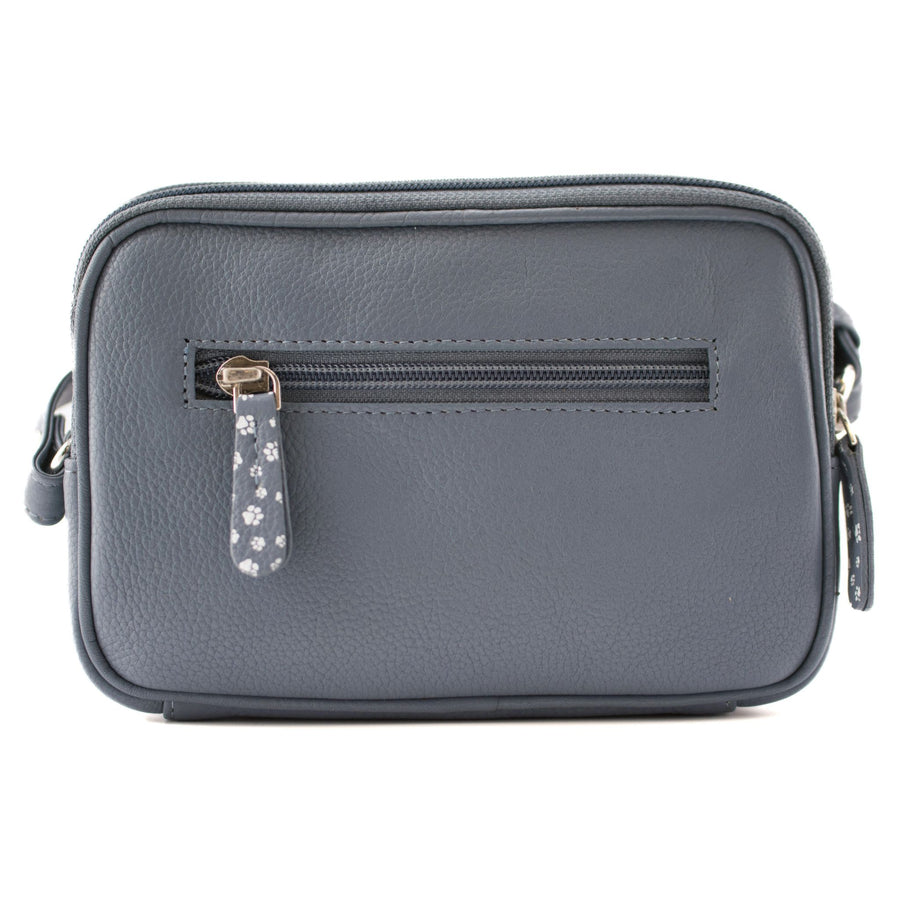 A grey pebbled leather camera bag with a front zippered pocket featuring a decorative gray and white floral zipper pull, shown against a plain white background.