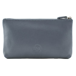 A rectangular pebbled leather zip pouch in a muted slate blue-grey color, featuring a debossed circular 'M' logo on the front.