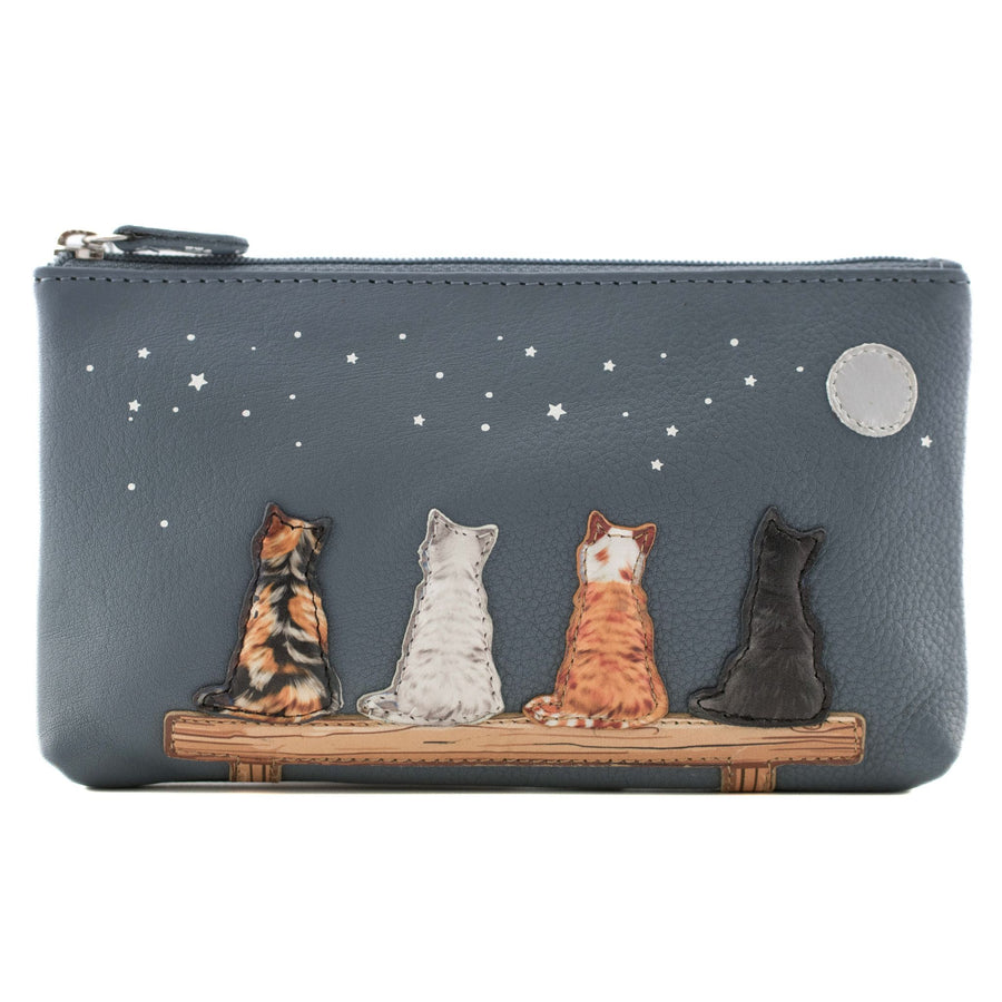 A slate blue pebbled leather zip pouch featuring four embroidered cats sitting on a bench under a starry night sky. 