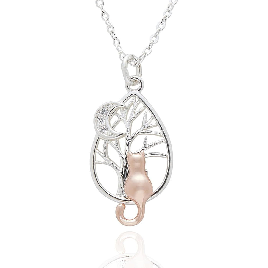 A silver teardrop pendant necklace featuring a tree design with a rose gold cat and a crescent moon, set against a plain white background.